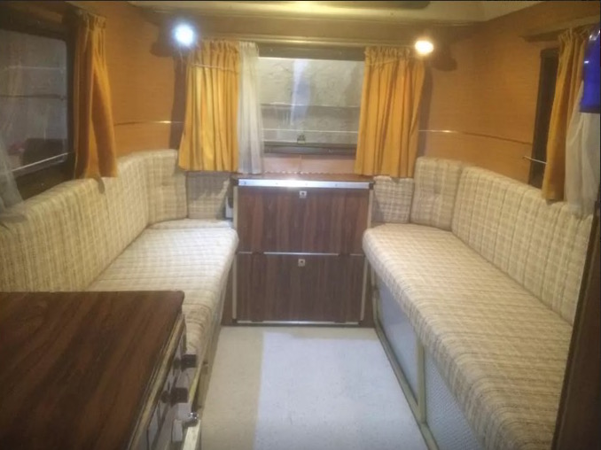 Vintage petit caravan in olive yard 8